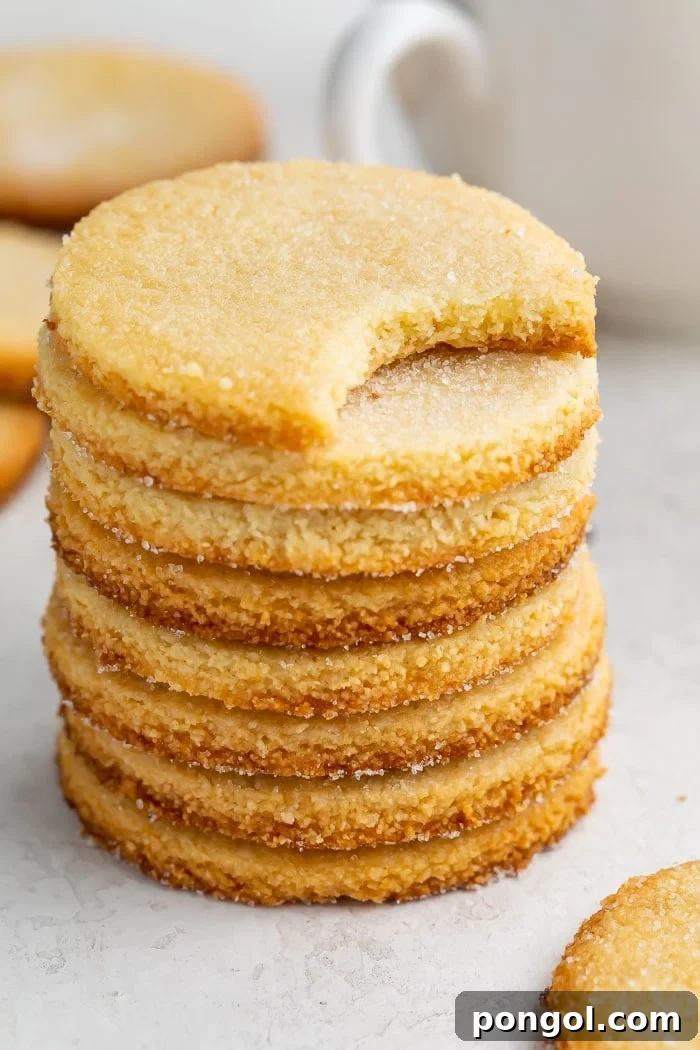 Close-up of stacked keto shortbread cookies, showcasing their tender texture