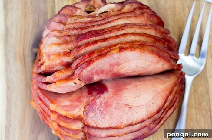 Stress-Free Thanksgiving: 19 Instant Pot Dishes 5 A beautifully glazed Instant Pot ham, cooked to perfection, showcasing a golden-brown crust and juicy interior, ready to be sliced and served.