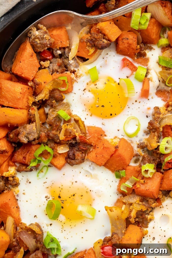 Close-up overhead shot of sweet potato hash in a skillet