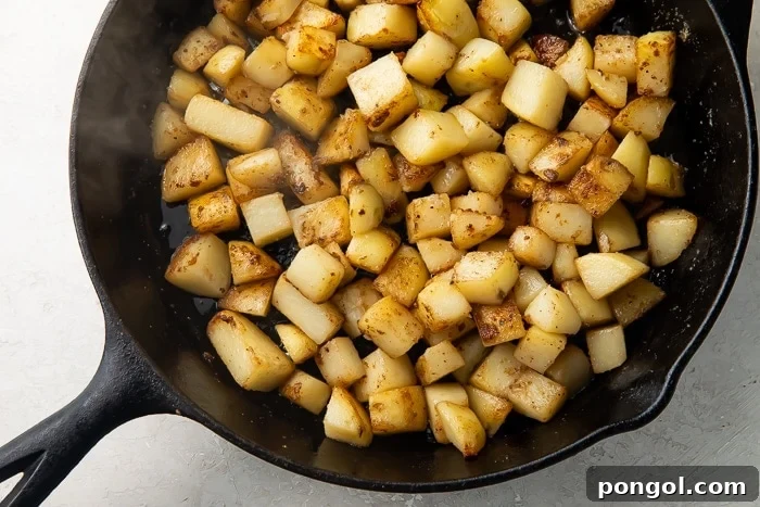 Gluten free roasted red potatoes in a cast iron skillet
