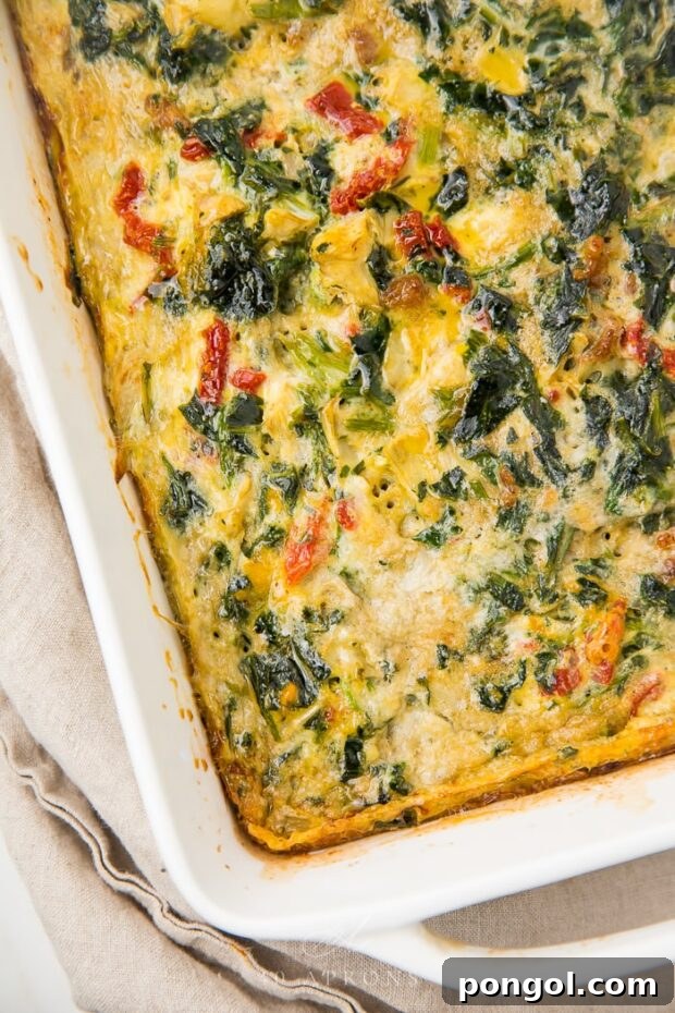 Hearty Italian Breakfast Casserole in a white baking dish, ready to serve.