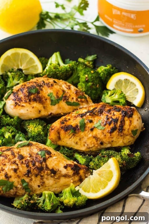 New Year, New You: 65 Satisfying Whole30 Meals 40 A skillet filled with tender chicken, bright lemon slices, and fresh broccoli florets.