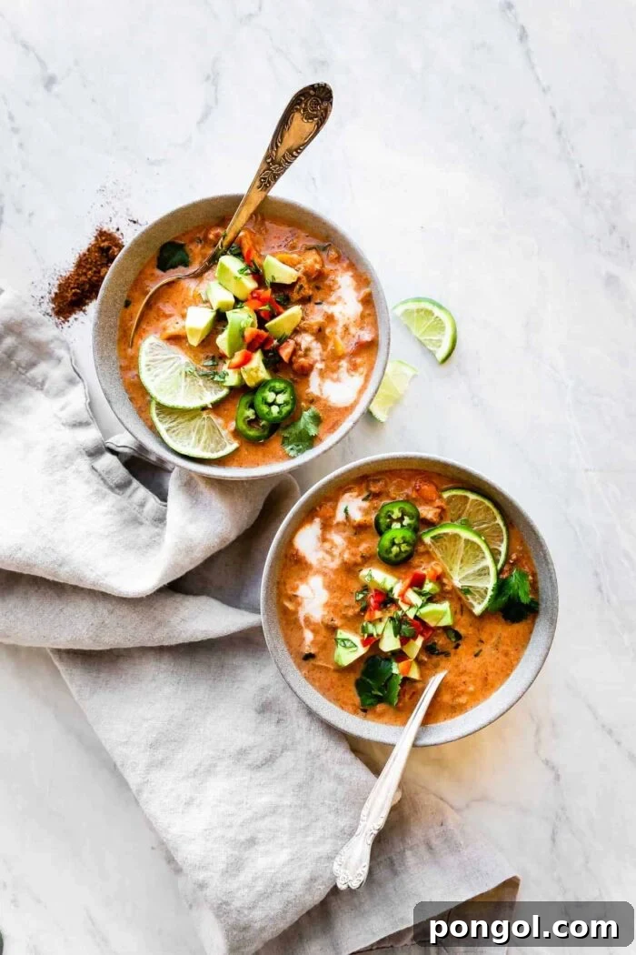 New Year, New You: 65 Satisfying Whole30 Meals 6 Two enticing bowls of Whole30 creamy taco soup, garnished and ready to be savored.