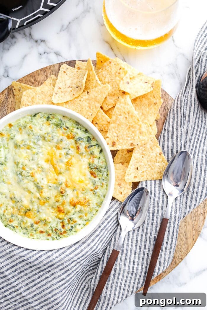 Vegetarian slow cooker spinach and artichoke dip