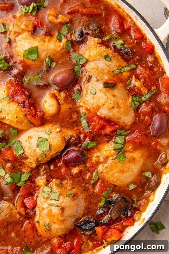 Pan of Whole30 chicken cacciatore simmering to perfection