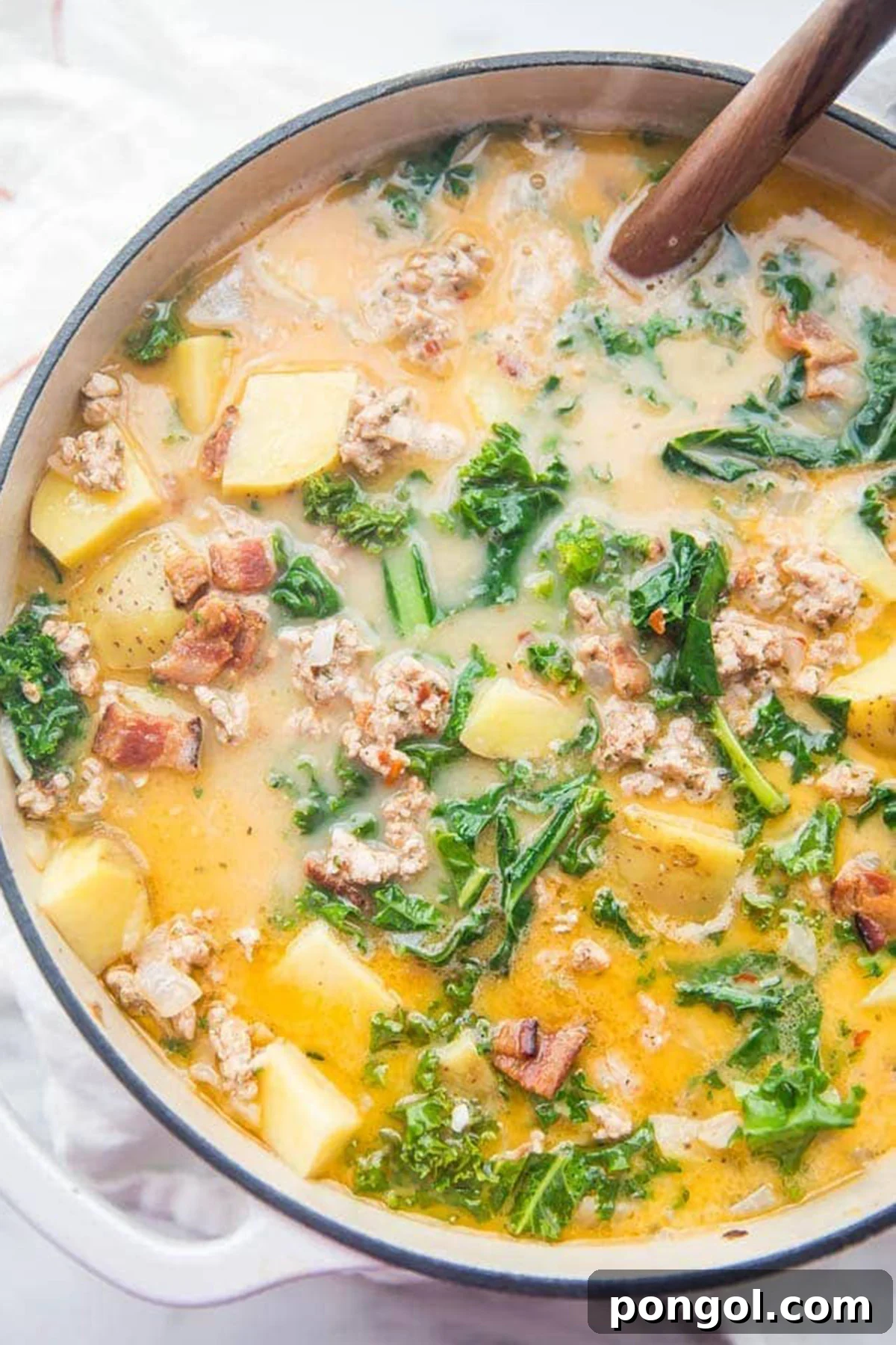 A large pot of Whole30 healthy zuppa toscana recipe.