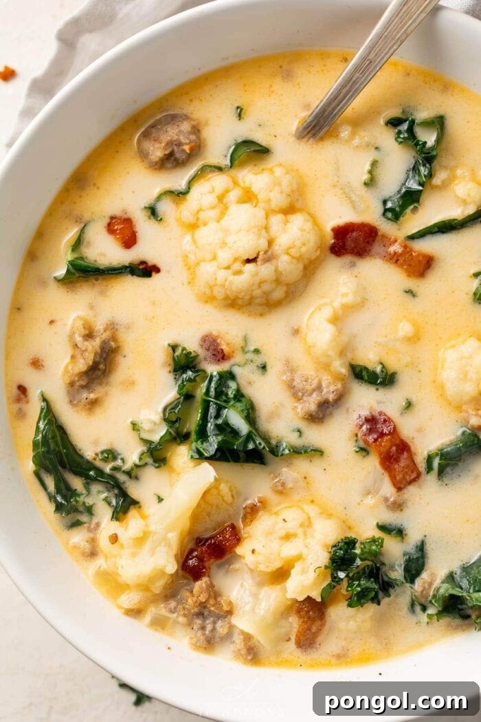 Close up photo of low carb zuppa toscana in a white bowl