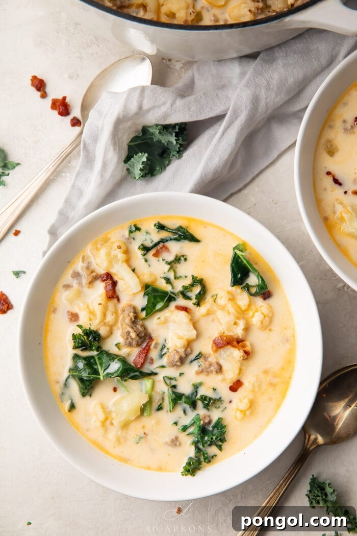A bowl of keto zuppa toscana in a white ceramic bowl on a table