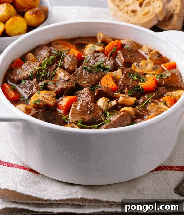 A white bowl of slow cooker beef stew