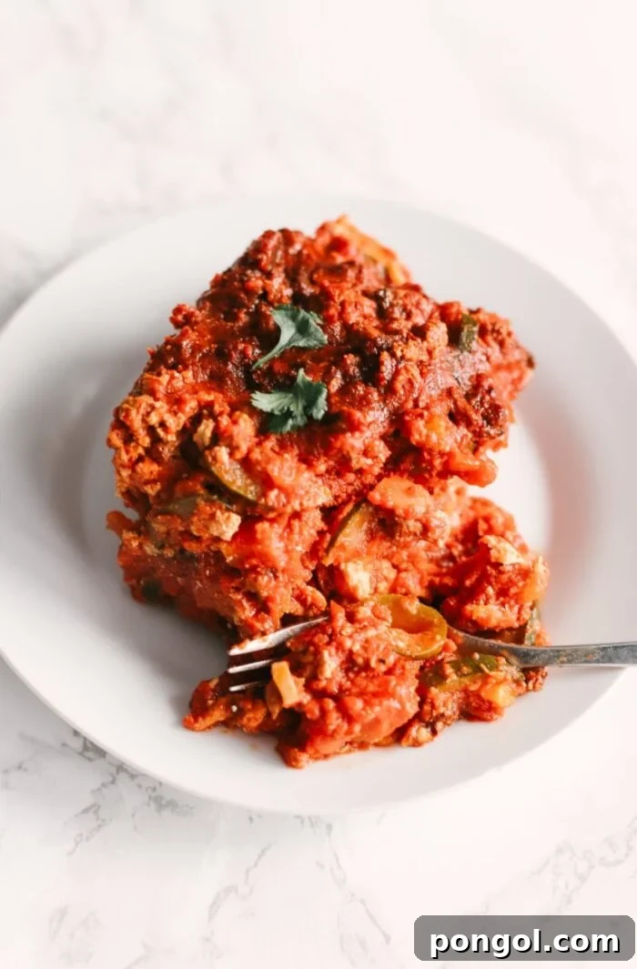 Zucchini lasagna on a white plate