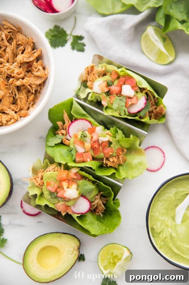 Keto slow cooker chicken tacos in lettuce wraps