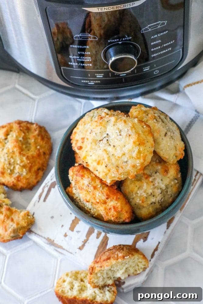 30 Delicious Keto Air Fryer Recipes 12 A bowl of keto rolls in front of an air fryer