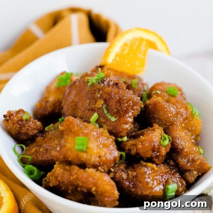 30 Delicious Keto Air Fryer Recipes 14 Air fryer keto orange chicken in a white bowl