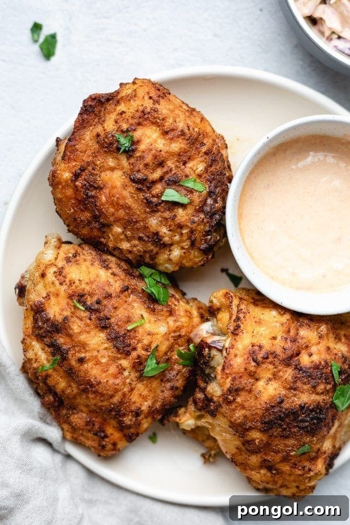 30 Delicious Keto Air Fryer Recipes 24 3 chipotle chicken thighs on a white plate