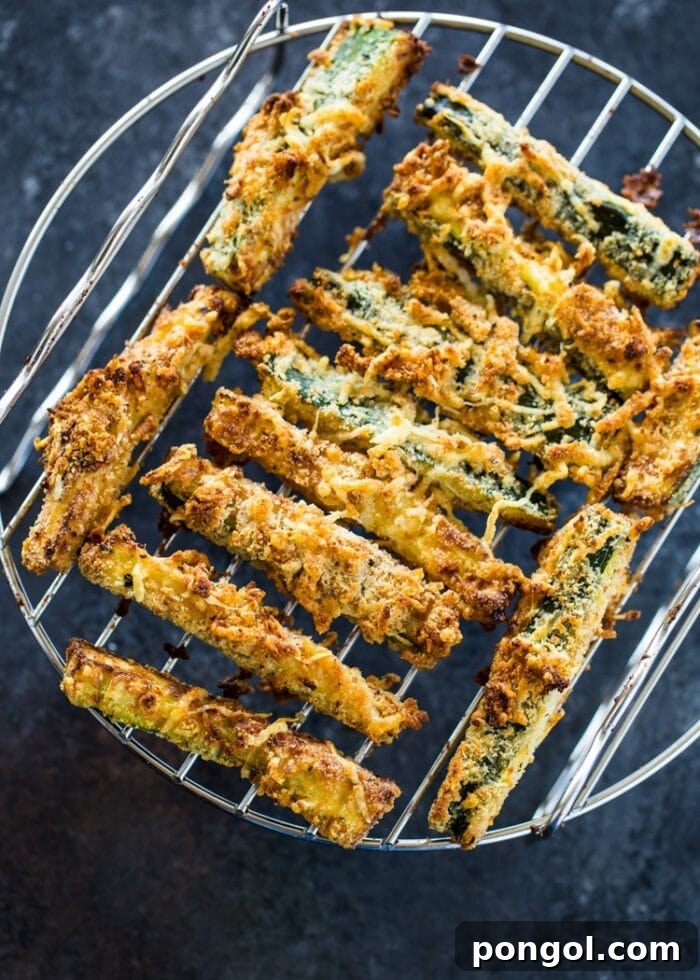 30 Delicious Keto Air Fryer Recipes 25 Zucchini fries on an air fryer rack