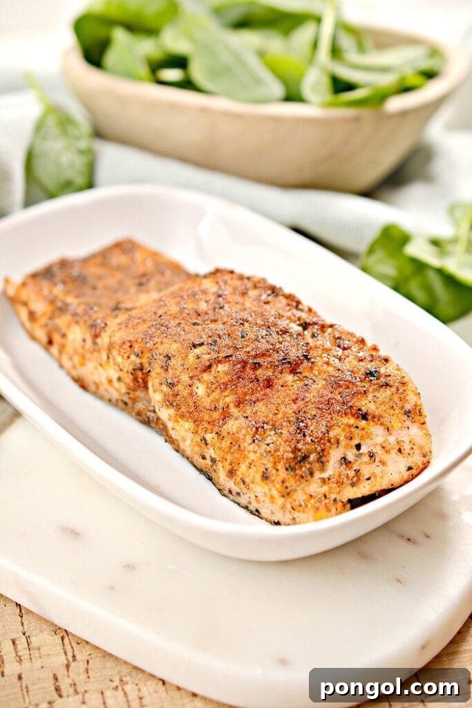 30 Delicious Keto Air Fryer Recipes 28 Blackened air fryer keto salmon filets on a white platter