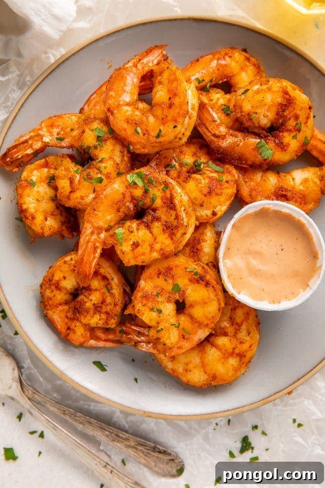 30 Delicious Keto Air Fryer Recipes 7 A plate of air fryer shrimp with comeback sauce