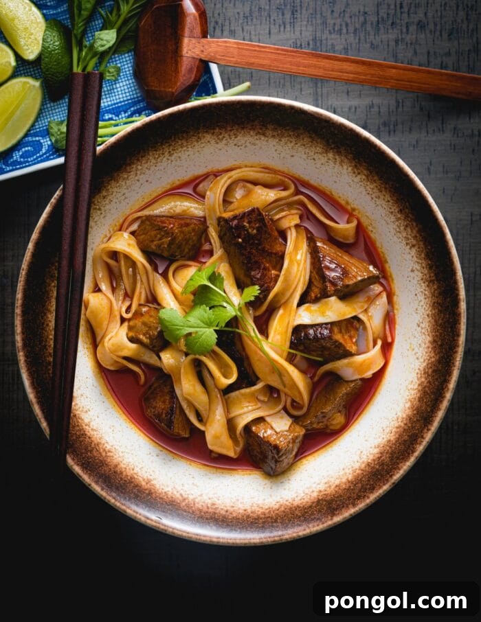 A comforting bowl of rich Vietnamese beef stew (Bo Kho) cooked to perfection with sous vide