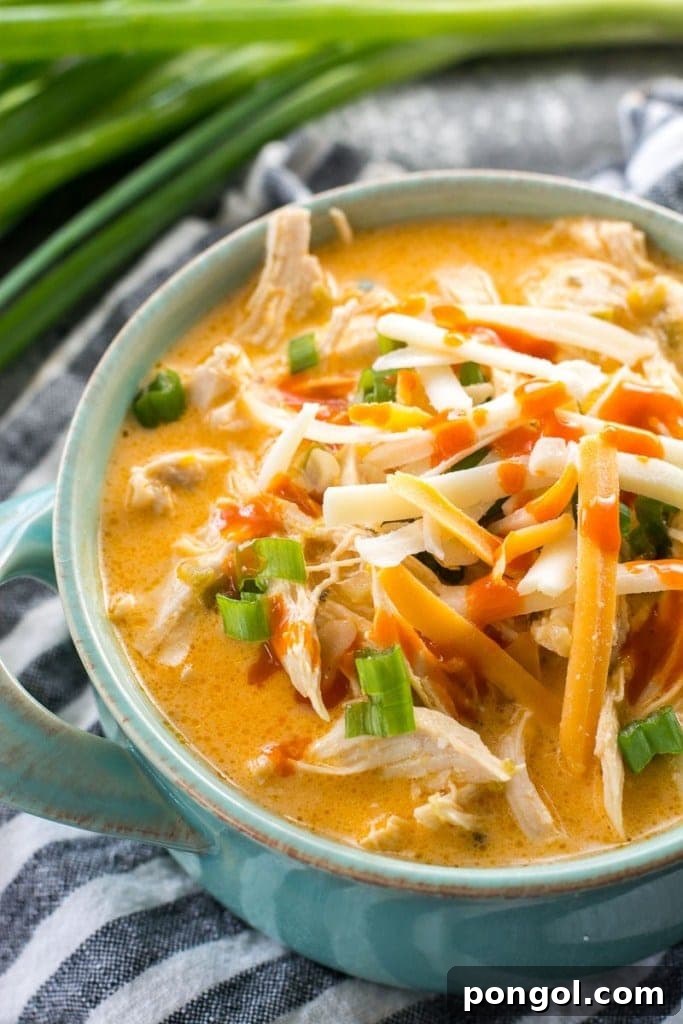 Buffalo chicken soup in a turquoise bowl