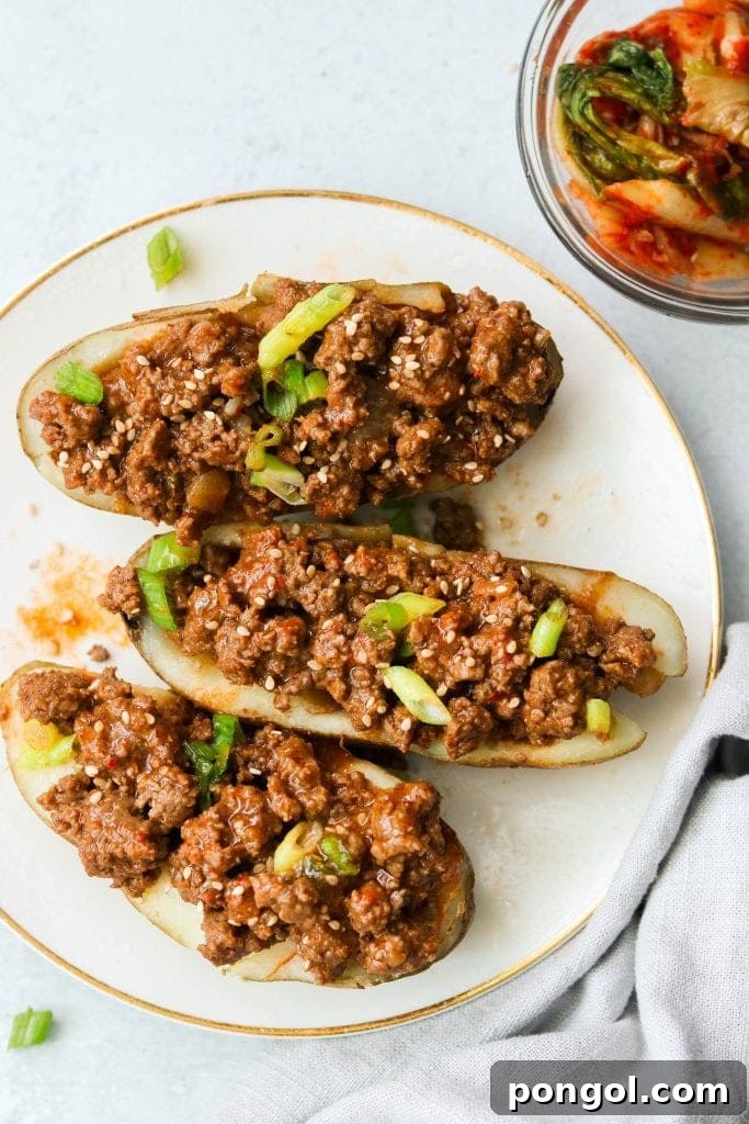 Korean sloppy joes on a white plate