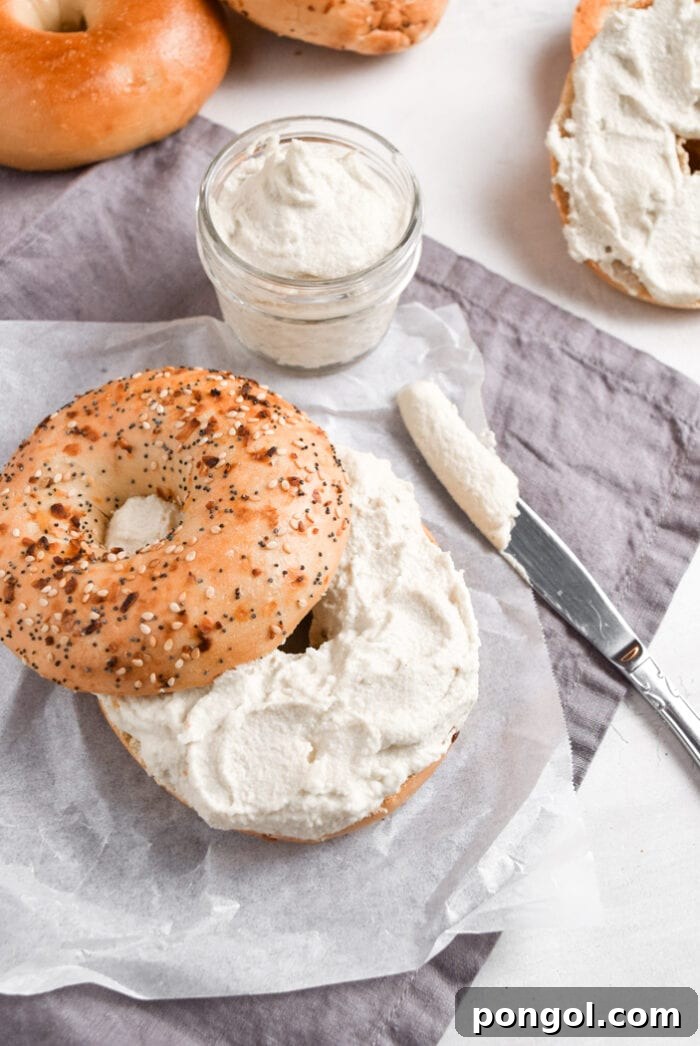 DIY Vegan Cream Cheese 2 Delicious homemade vegan cream cheese spread on a bagel.