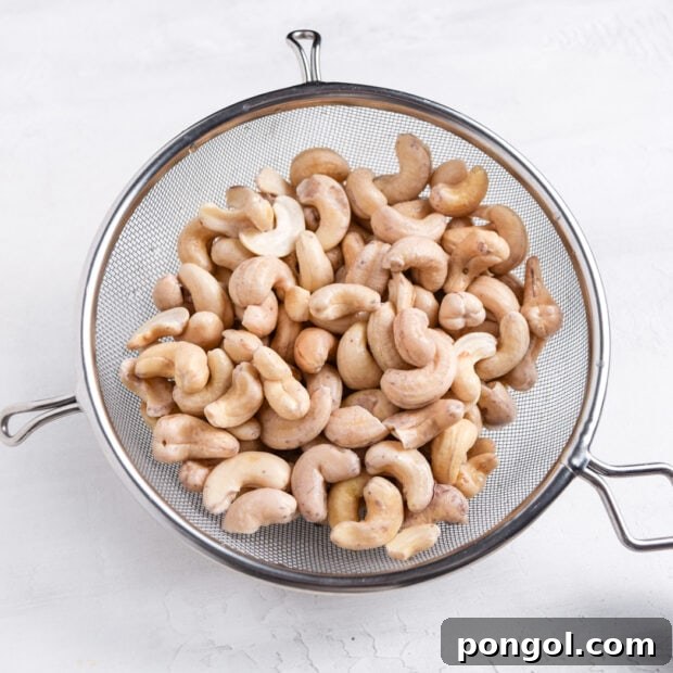 Drained and rinsed cashews in a bowl.