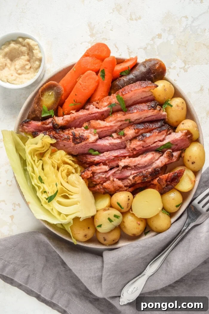 Perfectly Tender Sous Vide Corned Beef 3 Sliced Sous Vide Corned Beef with Cooked Vegetables