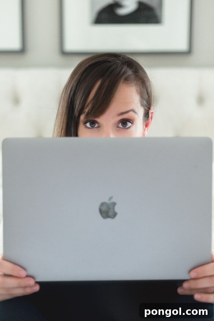 Unlocking Food Blog Revenue 5 Food blogger with Apple laptop