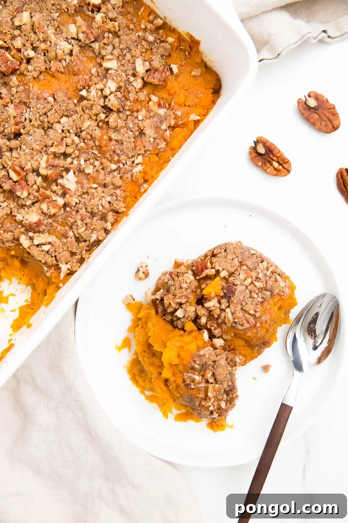 45 Delicious Coconut Milk Recipes 13 Sweet potato casserole scooped out onto a white plate