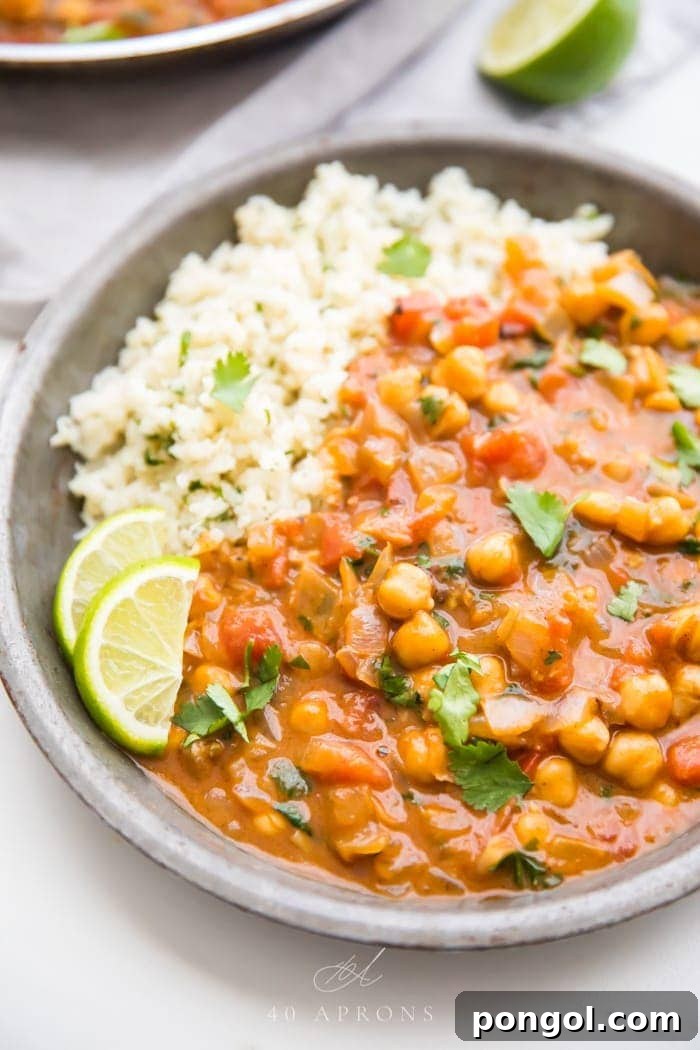 45 Delicious Coconut Milk Recipes 10 Coconut curry and rice in a grey bowl