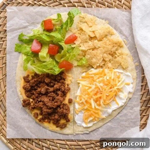 First step of the Mexican tortilla wrap hack process, showing cooked ground beef in a skillet