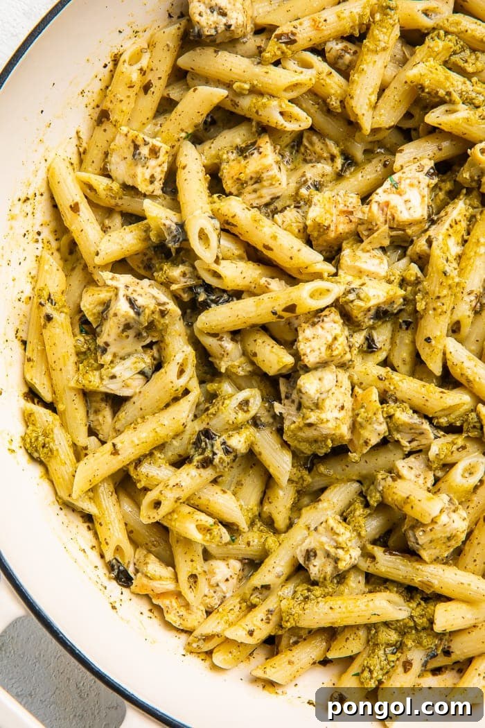 Close-up of chicken pesto pasta in a bowl