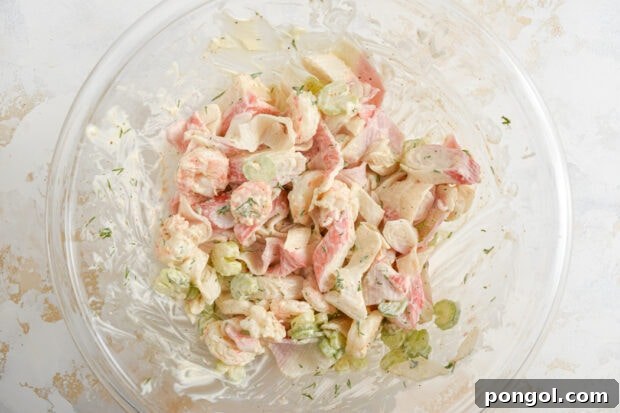 Mixing Seafood Salad Ingredients