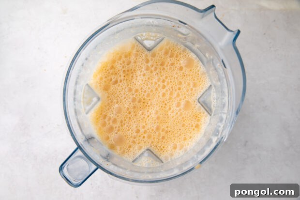 She crab soup liquid in blender.