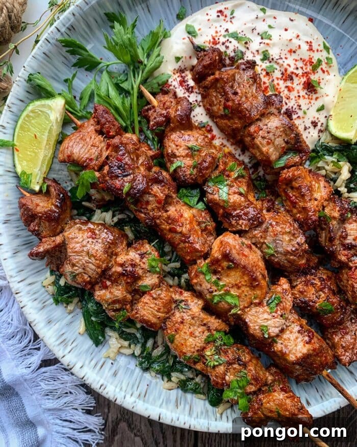 Lamb shish kebabs from Meliz Cooks, charred on skewers