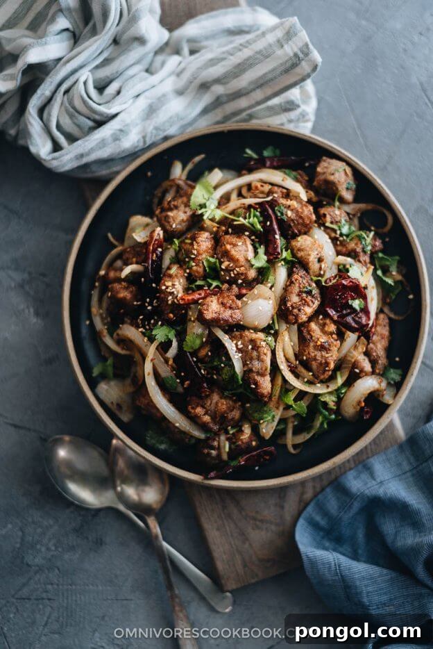 Xinjiang cumin lamb from Omnivore's Cookbook, stir-fried with peppers