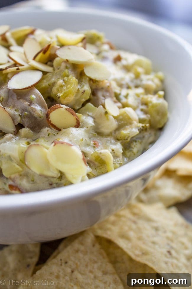 Creamy Broccoli Dip 4 Serving dish of broccoli dip with crunchy toppings.