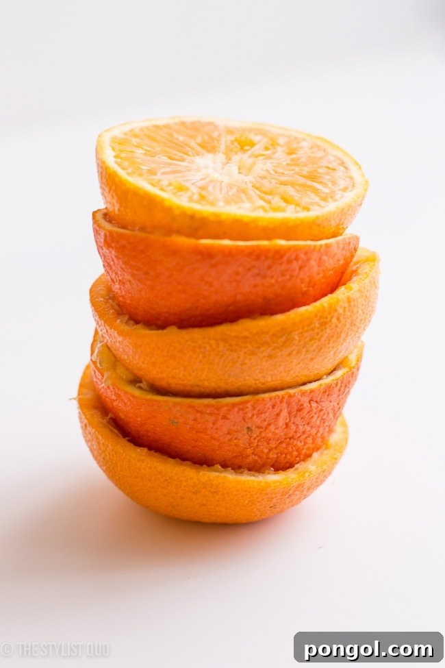 Clementine Margaritas served in elegant glasses, highlighting the orange color and festive feel of the drink.