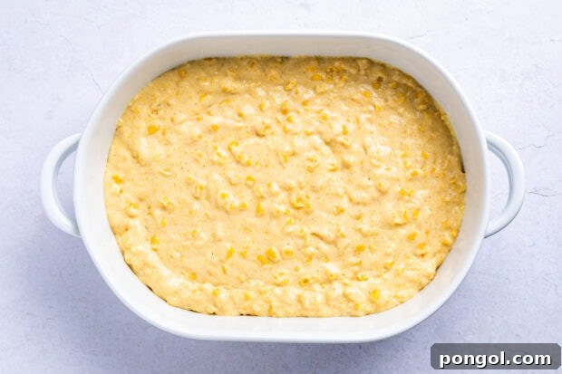 Golden Cornbread Delight 8 Cornbread casserole baking in a dish, turning golden brown.
