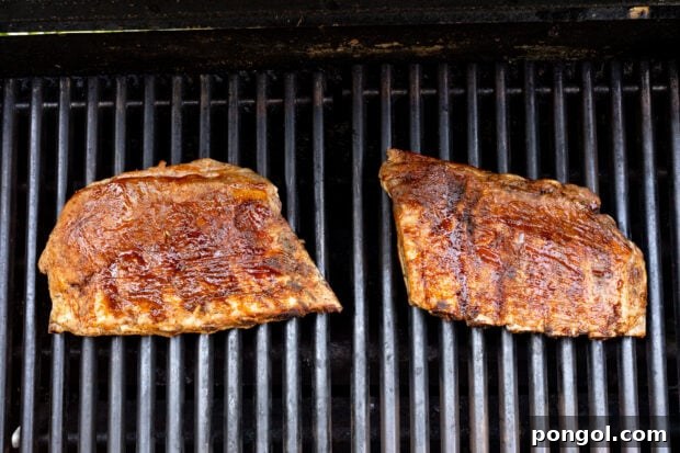 Grilling sous vide ribs to finish.