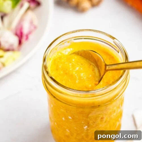 Japanese salad dressing in a jar with a spoon.