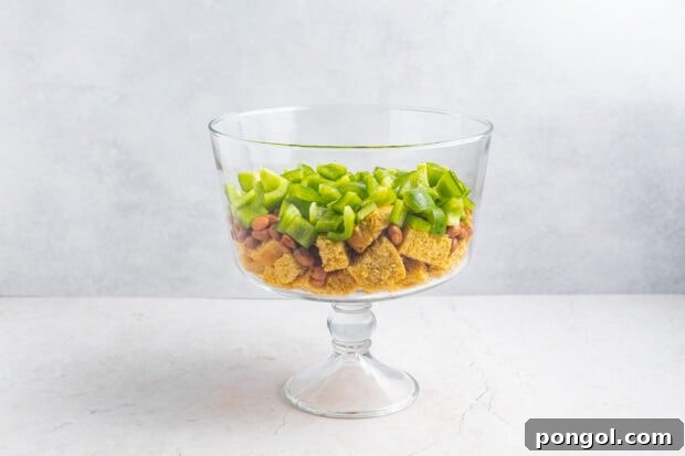 Layering pinto beans and bell pepper