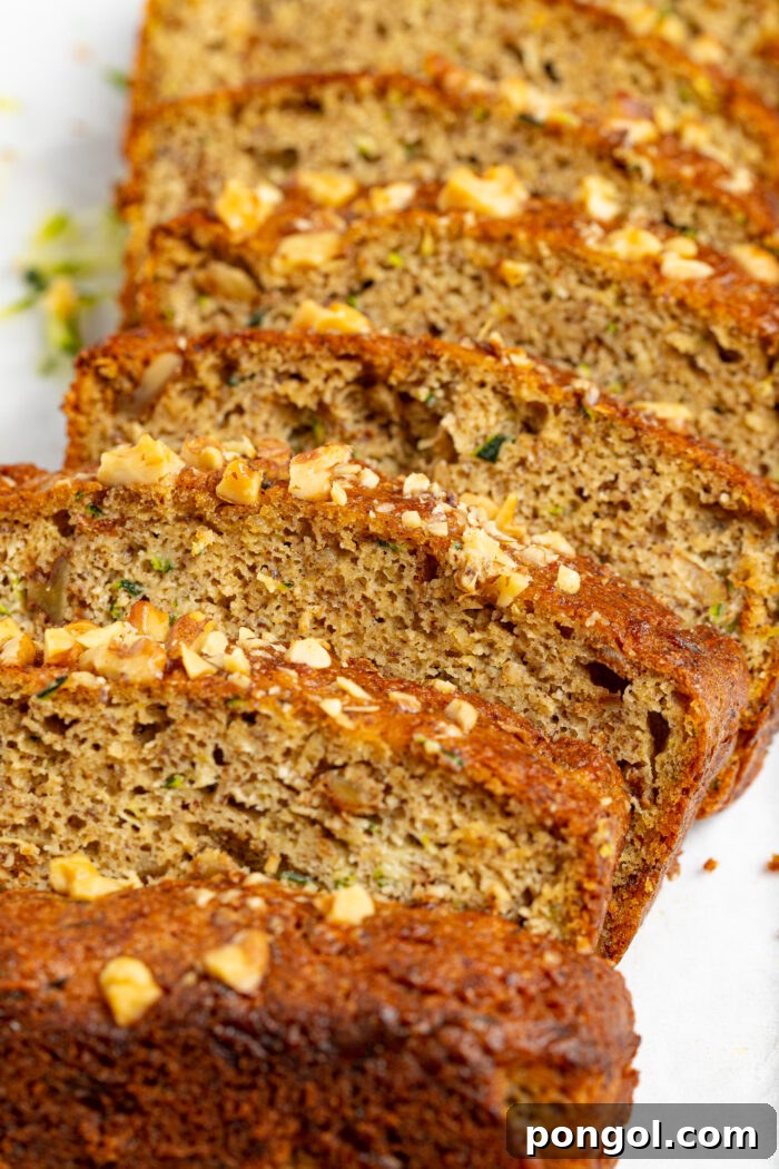 close up image of sliced keto zucchini bread