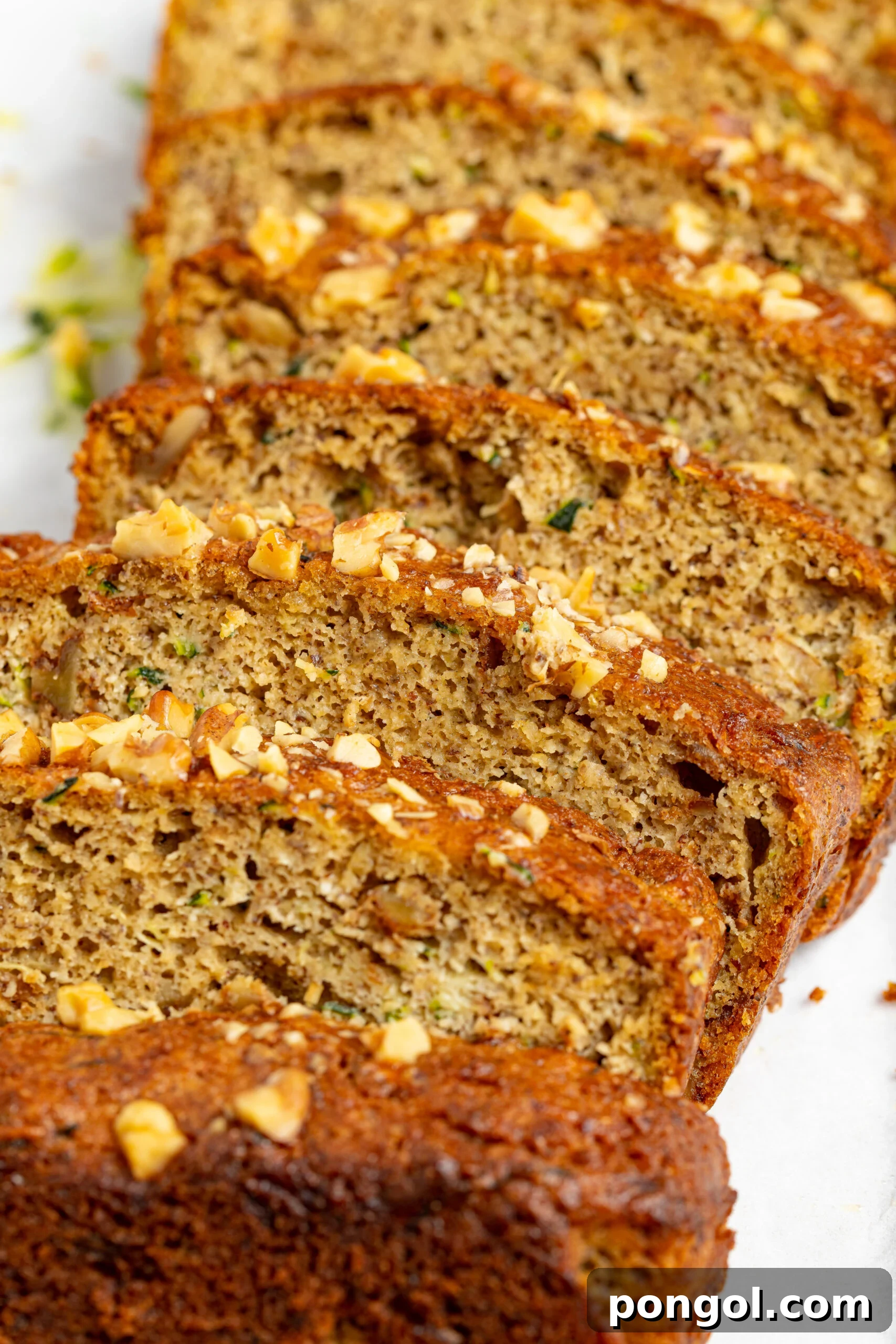 close up image of sliced keto zucchini bread
