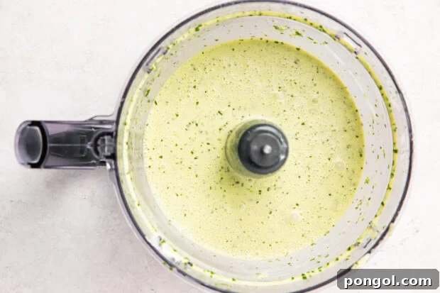 Cilantro-lime dressing in a food processor bowl