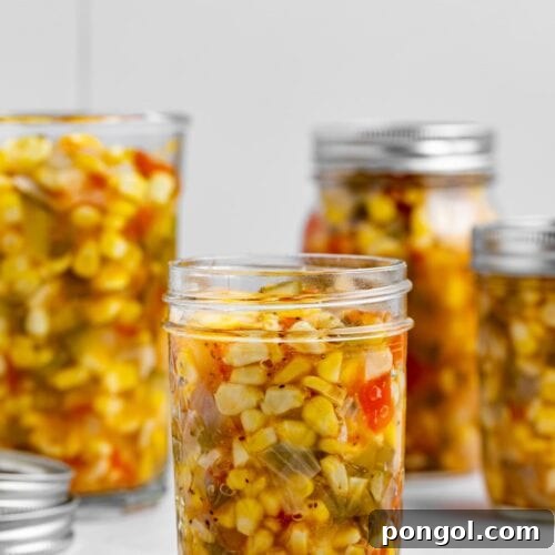 corn relish in four canning jars