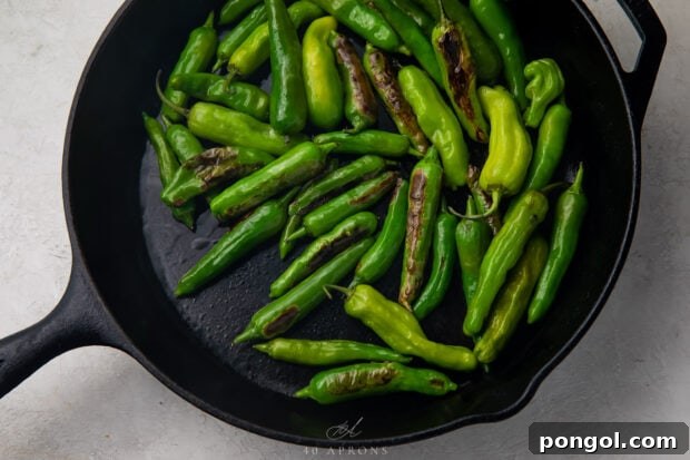 Shishito peppers in large cast iron skillet