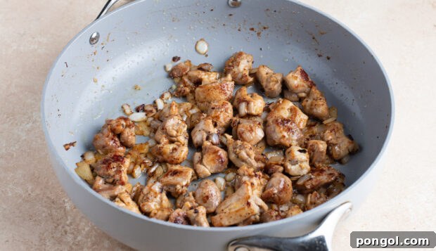 Rich and Creamy Peanut Chicken 8 Browned chicken with onion, ginger, and garlic in large skillet