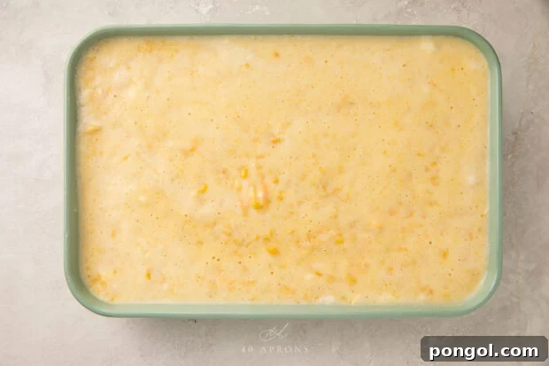 Corn souffle mixture in a souffle dish