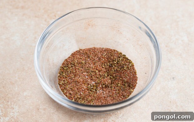 Blackened seasoning blend in large glass bowl